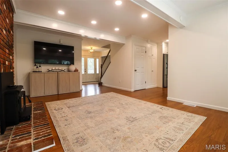 Family room has recessed lighting and wood flooring — 2502 Forest Leaf Parkway, Wildwood, MO 63011