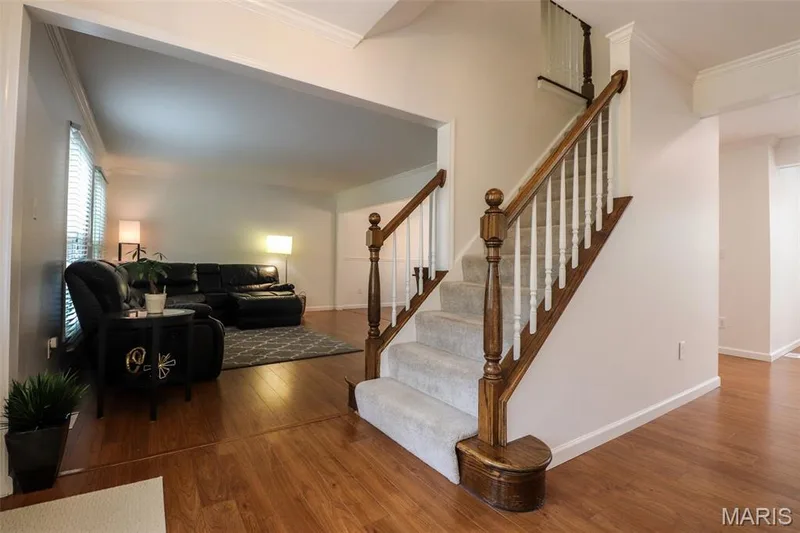 Open entry foyer with wood flooring — 2502 Forest Leaf Parkway, Wildwood, MO 63011
