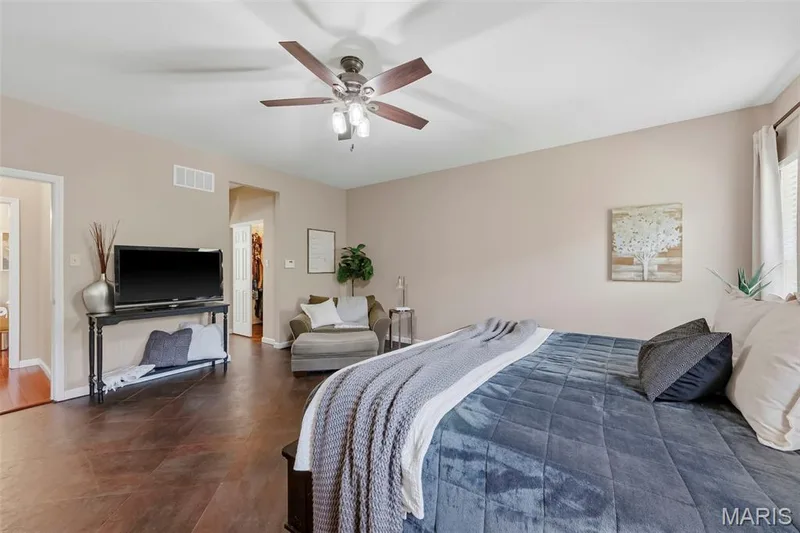 Spacious Primary Suite with 2 walk in closets connecting to bathroom — 106 Crimson Oaks Court, Lake St. Louis, MO 63367