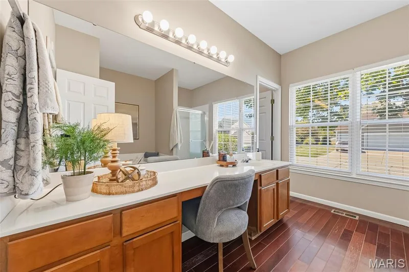 Lots of natural light & plenty of room in the primary bath w/separate toilet room — 106 Crimson Oaks Court, Lake St. Louis, MO 63367