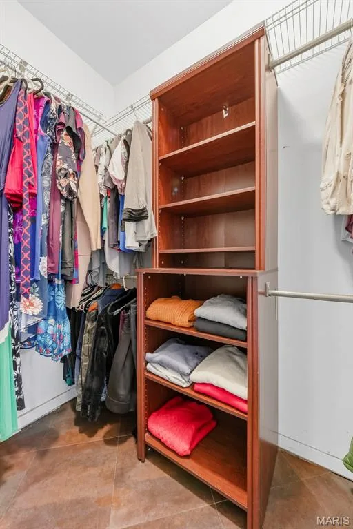 1 of 2 walk-in closets in primary — 106 Crimson Oaks Court, Lake St. Louis, MO 63367