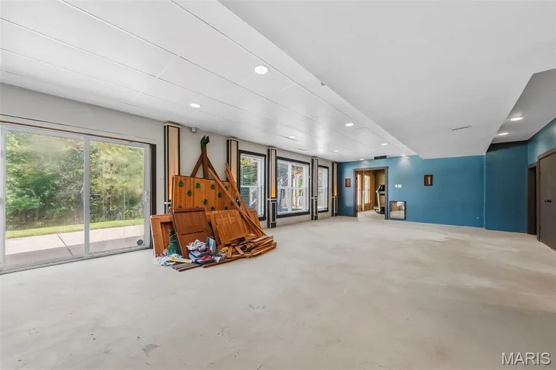 HUGE! Family room in walk-out lower level. Has ceiling & drywall; awaiting your final touches! — 106 Crimson Oaks Court, Lake St. Louis, MO 63367