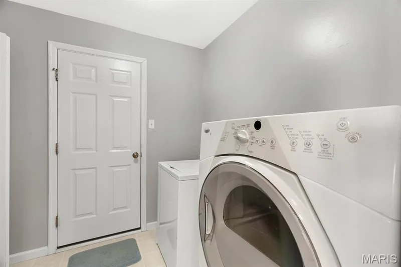 Main Floor Laundry/ Mud Room leading to garage — 3121 Grace Hill Drive, Lake St. Louis, MO 63367