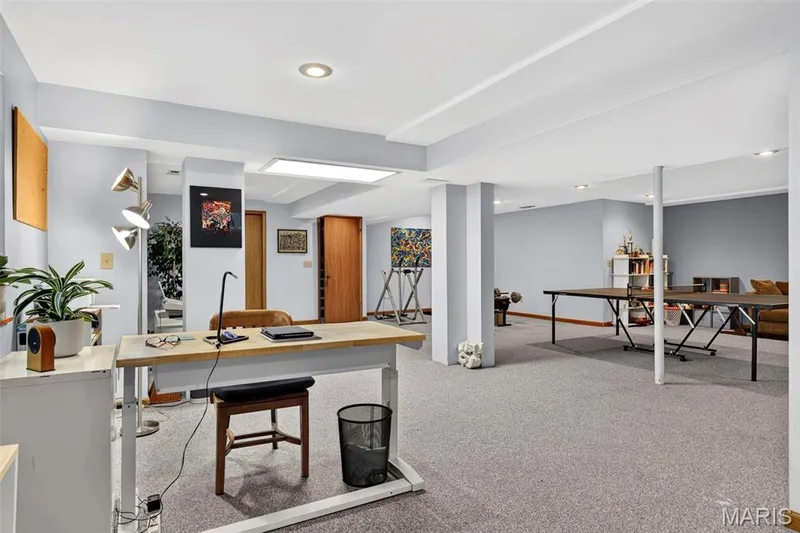 Open-concept area featuring wall-to-wall carpeting, recessed lighting, and a flush-mount panel light — 120 Oak Valley Drive, St Peters, MO 63376