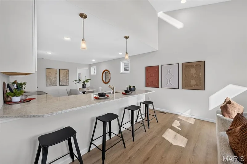Extra breakfast bar seating — 4018 Barretts Creek Drive, St Charles, MO 63301