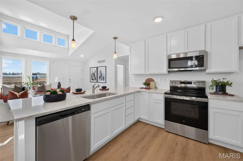 Plenty of white cabinetry! — 4018 Barretts Creek Drive, St Charles, MO 63301