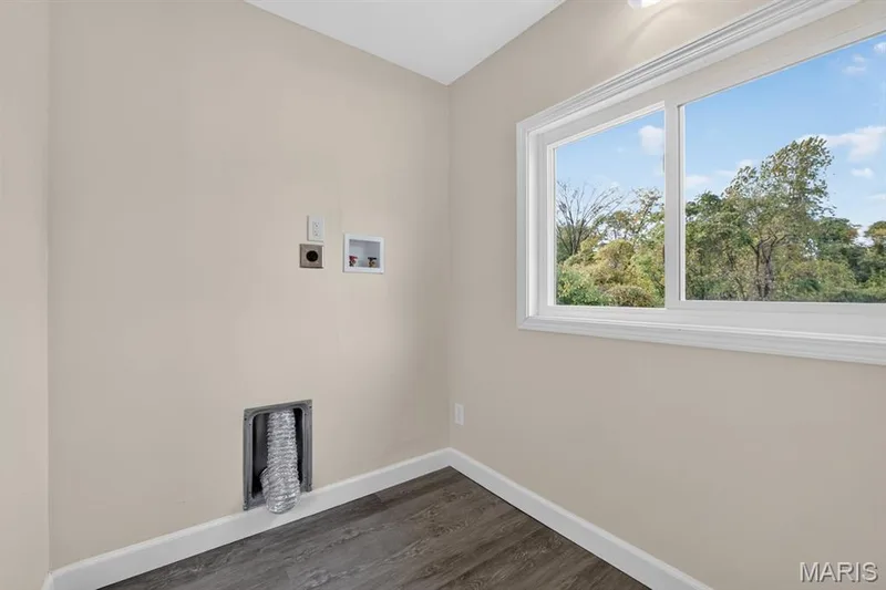 Main floor laundry room off dining room — 27 Lillian Drive, St Charles, MO 63304