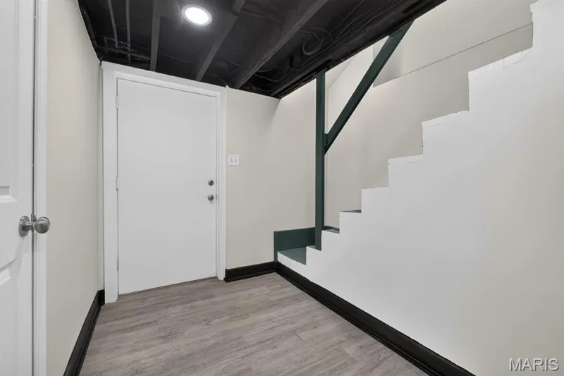 Basement hall and backyard entry — 27 Lillian Drive, St Charles, MO 63304