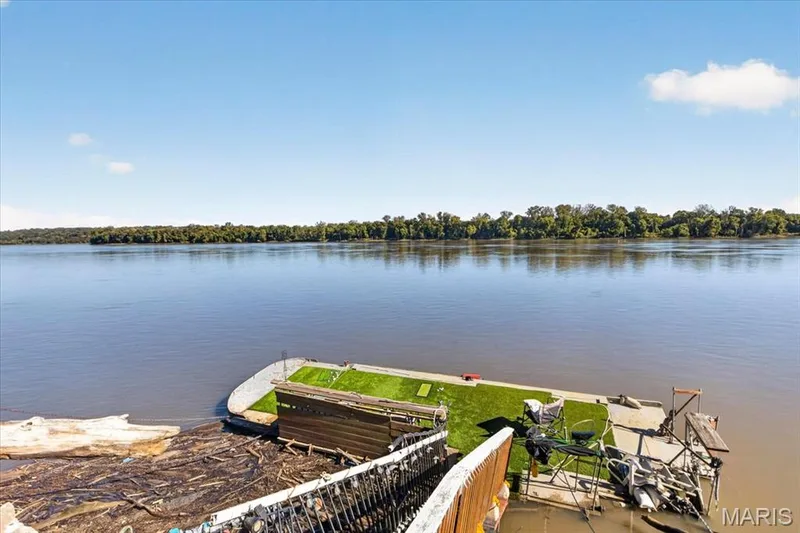 Private floating dock featuring synthetic turf surfacing and metal railings — 69 Weule Boat Harbor, St Charles, MO 63301