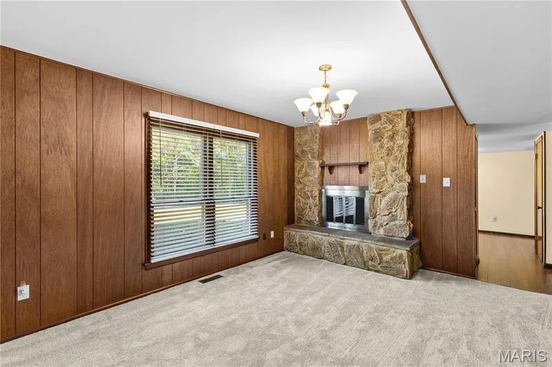 Woodburning fireplace makes the family room cozy & warm! — 15 Bridlewood Drive, Lake St. Louis, MO 63367