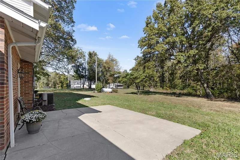 Expansive patio for watching the leaves changes & stunning glimpses of Lake Saint Louis! — 15 Bridlewood Drive, Lake St. Louis, MO 63367