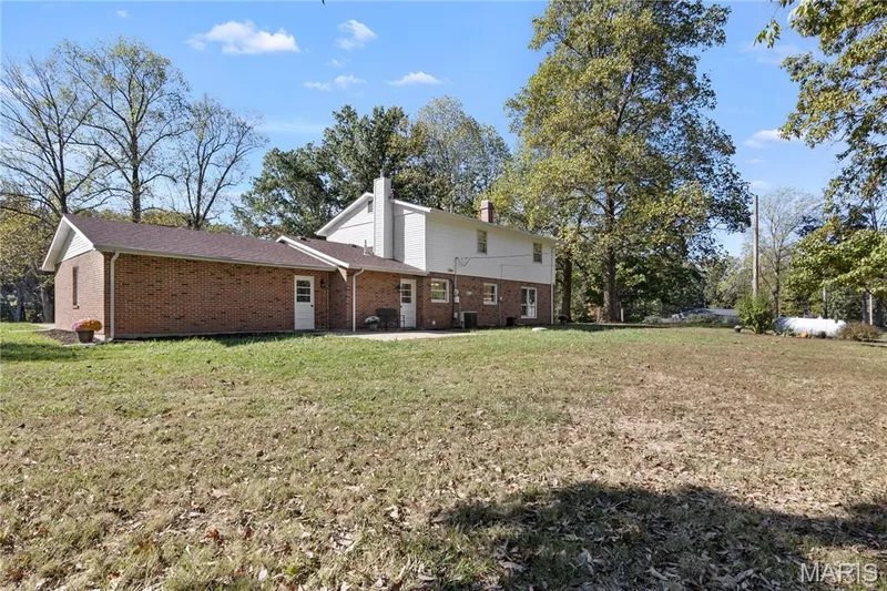 1.59 acre level lot is open yet private with mature trees & gorgeous views! — 15 Bridlewood Drive, Lake St. Louis, MO 63367