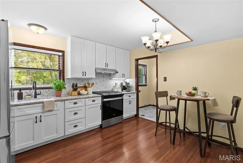 Updated Eat in Kitchen with granite, marble & stainless steel! — 15 Bridlewood Drive, Lake St. Louis, MO 63367