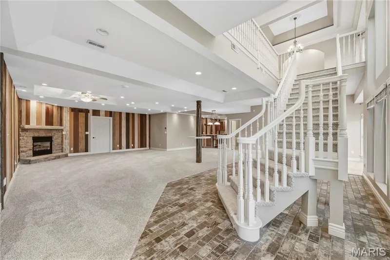 Atrium staircase — 2221 Blue Lake Drive, Wentzville, MO 63385