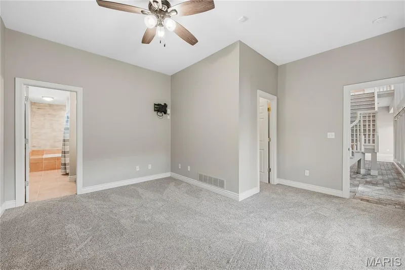 LL Bedroom with walk in closet and private bathroom — 2221 Blue Lake Drive, Wentzville, MO 63385