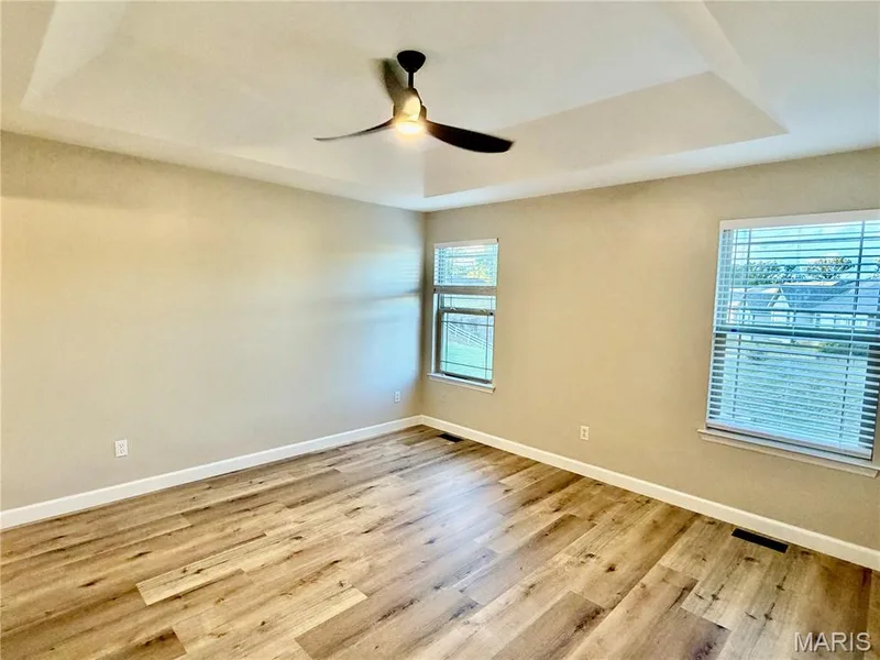 Primary bedroom suite offers a walk-in closet — 22 Ivy Brook Court, Wentzville, MO 63385