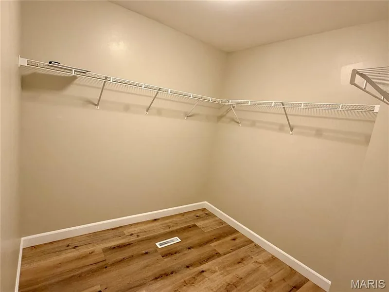 Primary bedroom walk in closset — 22 Ivy Brook Court, Wentzville, MO 63385