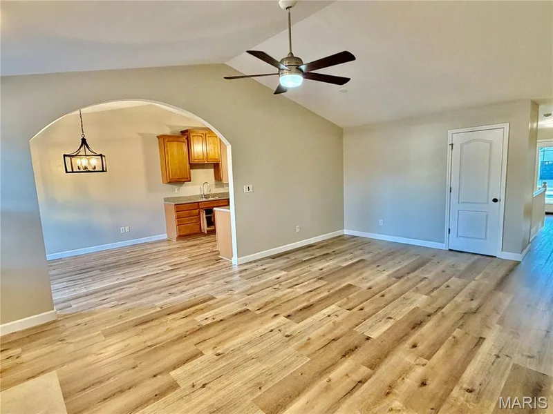 Great room to kitchen — 22 Ivy Brook Court, Wentzville, MO 63385