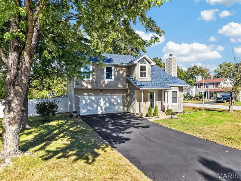 Freshly sealed driveway — 600 Turtle Creek Court, St Peters, MO 63376