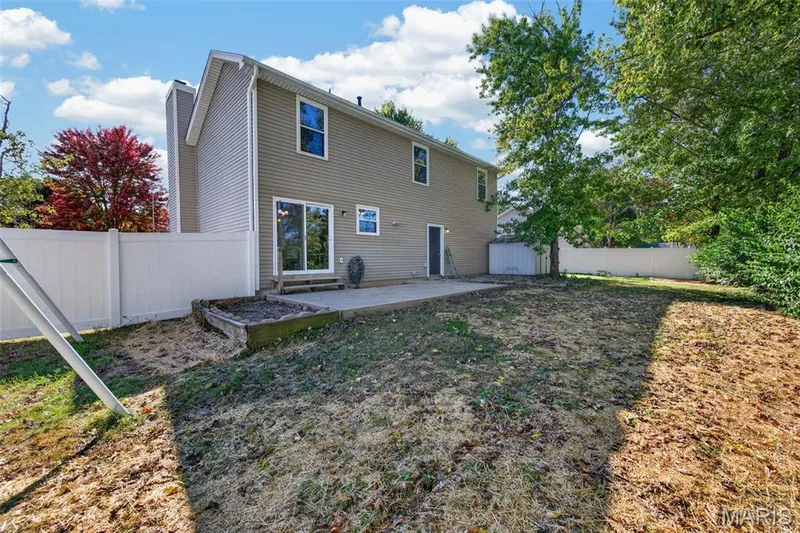 Lawn over seeded and fertilized with hay overlay to prevent wash away — 600 Turtle Creek Court, St Peters, MO 63376