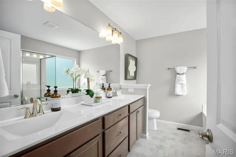 Photo representation of a similar home.  Some features shown may be optional. — 1 TBB Devonshire @Harvest Cottages, O'Fallon, MO 63385