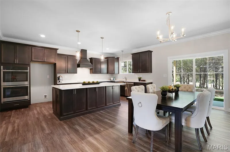 Upgraded kitchen package with double oven, cabinet hood and microwave drawer shown — Cypress-Ests @ Schaper Farms, Foristell, MO 63348
