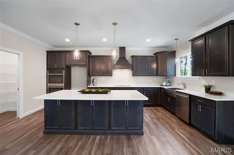 Large island with quartz countertops — Cypress-Ests @ Schaper Farms, Foristell, MO 63348