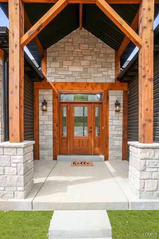 Optional Front Porch with stone and cedar beams shown. (Photo of previously built Sycamore - upgrades may be shown) — Sycamore-Ests @ Schaper Farms, Foristell, MO 63348