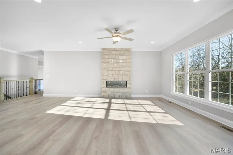 9 foot flat ceilings shown throughout. Neutral paint tones and LVP in great room. (Photo of previously built Sycamore - upgrades may be shown) — Sycamore-Ests @ Schaper Farms, Foristell, MO 63348