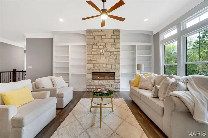 Optional custom bookshelves in Great Room and optional fireplace. (Photo of previously built Sycamore-upgrades may be shown). — Sycamore-Ests @ Schaper Farms, Foristell, MO 63348