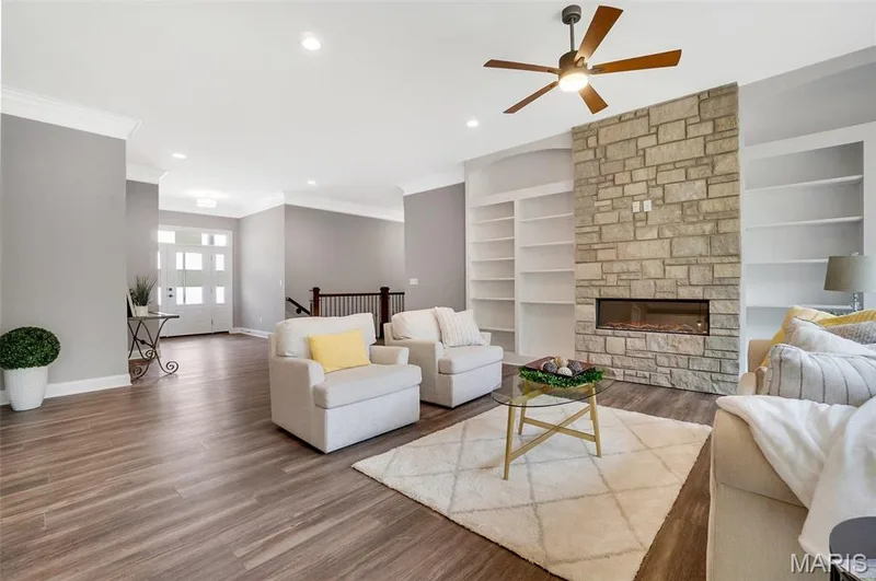 Optional upgrades shown include etched front door & custom bookshelves.(Photo of previously built Sycamore - upgrades may be shown) — Sycamore-Ests @ Schaper Farms, Foristell, MO 63348