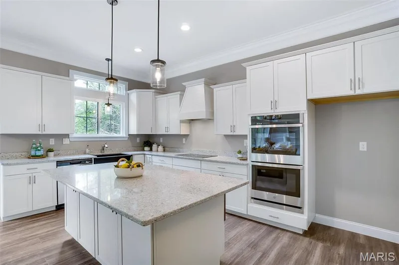 Optional Upgraded kitchen with built-in double oven. (Photo of previously built Sycamore - upgrades may be shown) — Sycamore-Ests @ Schaper Farms, Foristell, MO 63348