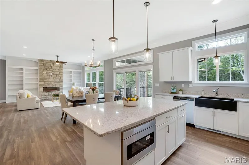 Optional upgraded kitchen with microwave drawer and quartz farmhouse sink. (Photo of previously built Sycamore - upgrades may be shown) — Sycamore-Ests @ Schaper Farms, Foristell, MO 63348