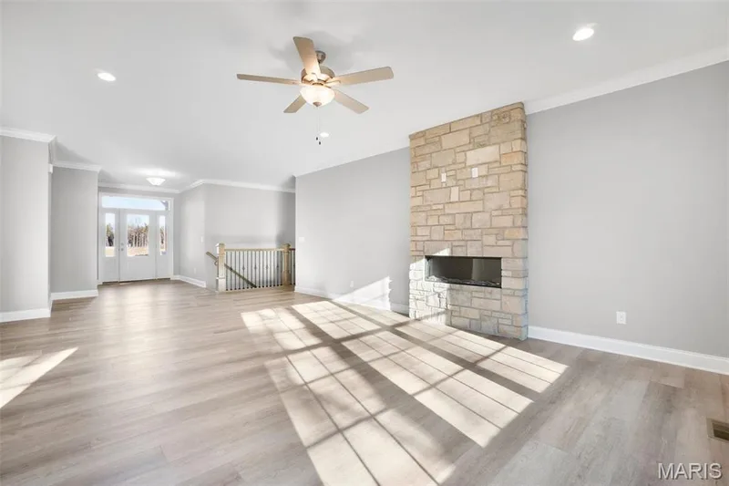 Great room and entry foyer with 1 paint color throughout. (Photo of previously built Sycamore - upgrades may be shown) — Sycamore-Ests @ Schaper Farms, Foristell, MO 63348