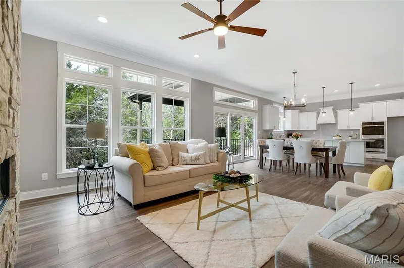 Sycamore shown including 10 ft ceilings, transoms, triple slider and upgraded kitchen package. (Photo of previously built Sycamore - upgrades may be shown) — Sycamore-Ests @ Schaper Farms, Foristell, MO 63348