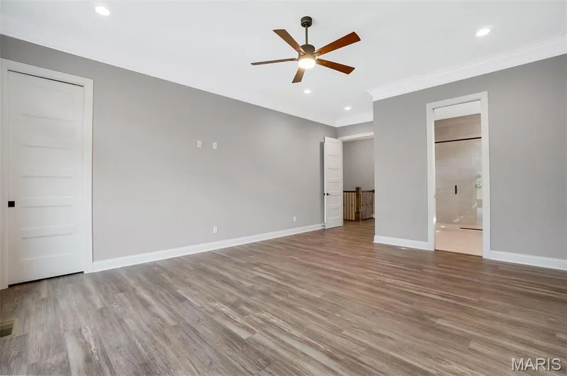 Primary suite with 3 piece crown and LVP flooring. (Photo of previously built Sycamore - upgrades may be shown) — Sycamore-Ests @ Schaper Farms, Foristell, MO 63348