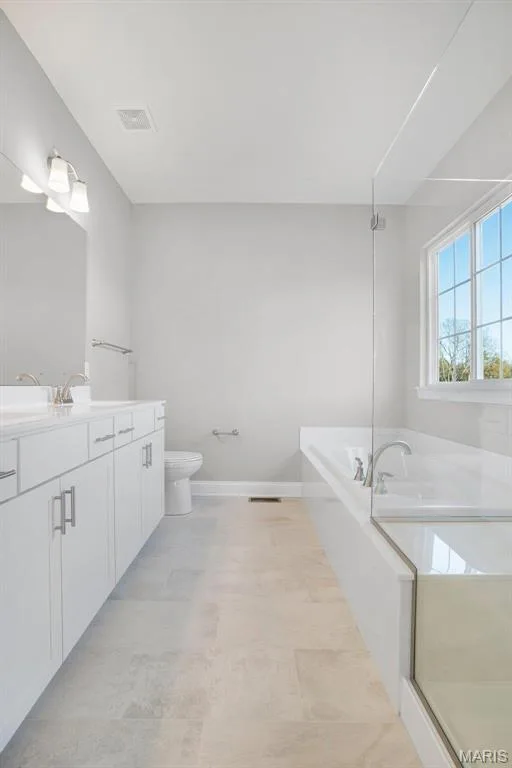 Standard luxury master bath with separate tub and shower. (Photo of previously built Sycamore - upgrades may be shown) — Sycamore-Ests @ Schaper Farms, Foristell, MO 63348