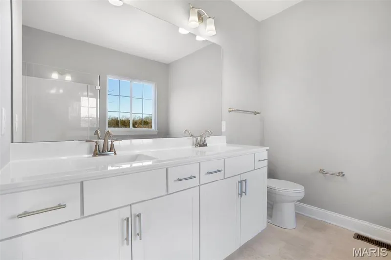 Standard Dual vanity, linen closet and plenty of natural lighting. (Photo of previously built Sycamore - upgrades may be shown) — Sycamore-Ests @ Schaper Farms, Foristell, MO 63348