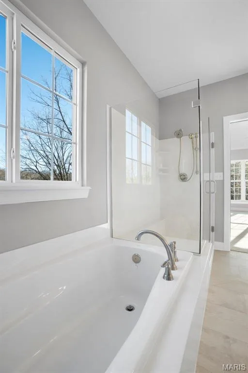 Standard tub and shower  shown with window. (Photo of previously built Sycamore - upgrades may be shown) — Sycamore-Ests @ Schaper Farms, Foristell, MO 63348