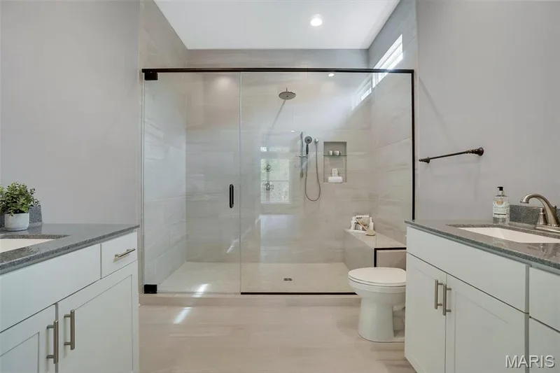 Tile walk-in shower with transoms and rain shower. (Photo of previously built Sycamore - upgrades may be shown) — Sycamore-Ests @ Schaper Farms, Foristell, MO 63348