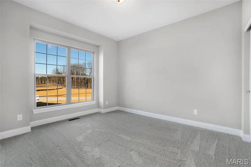 Standard Bedroom 3 with double window and box bay and carpeting. (Photo of previously built Sycamore - upgrades may be shown) — Sycamore-Ests @ Schaper Farms, Foristell, MO 63348