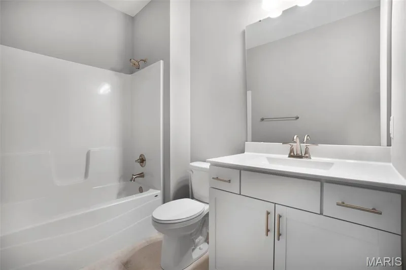 Standard Hall bath includes linen closet and tub/shower combo. (Photo of previously built Sycamore - upgrades may be shown) — Sycamore-Ests @ Schaper Farms, Foristell, MO 63348