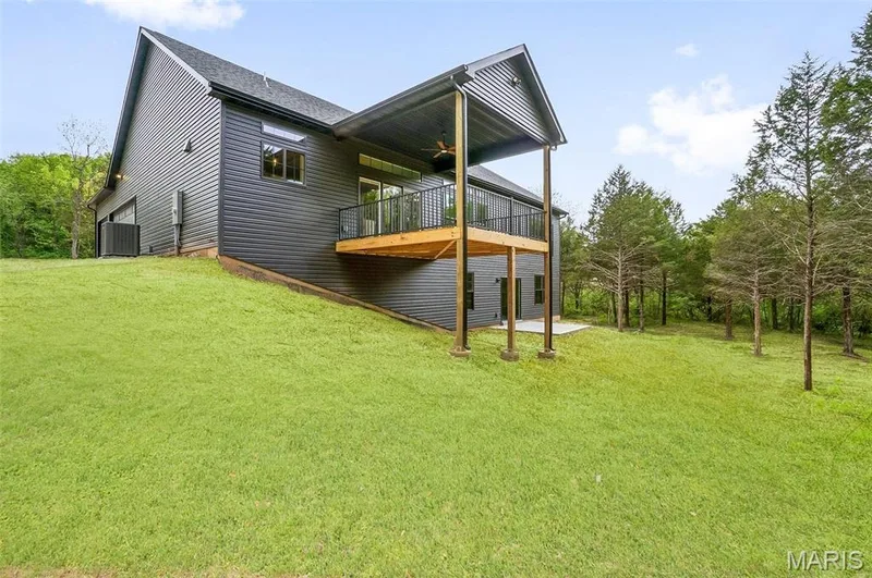 Covered Deck on previously built home. (Photo of previously built Sycamore - upgrades may be shown) — Sycamore-Ests @ Schaper Farms, Foristell, MO 63348