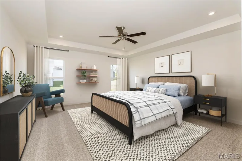 Bedroom with a tray ceiling, light colored carpet, a ceiling fan, and recessed lighting — 717 Southerland Drive, O'Fallon, MO 63368