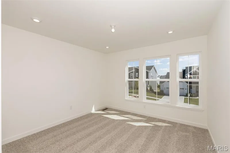 Carpeted spare room featuring recessed lighting — 717 Southerland Drive, O'Fallon, MO 63368